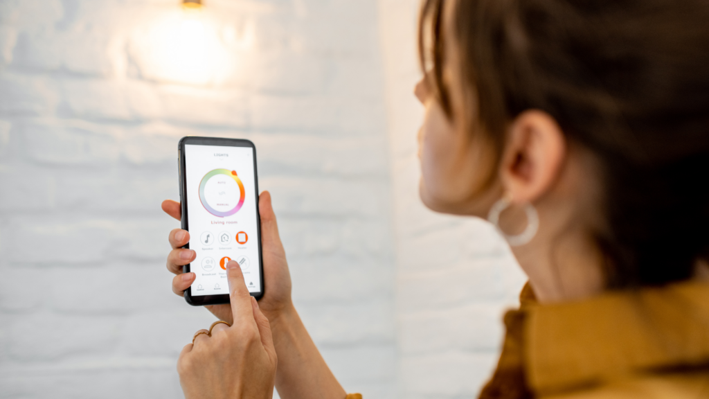 A host adjusting dimmable lights to achieve the desired ambiance and comfort for clients.