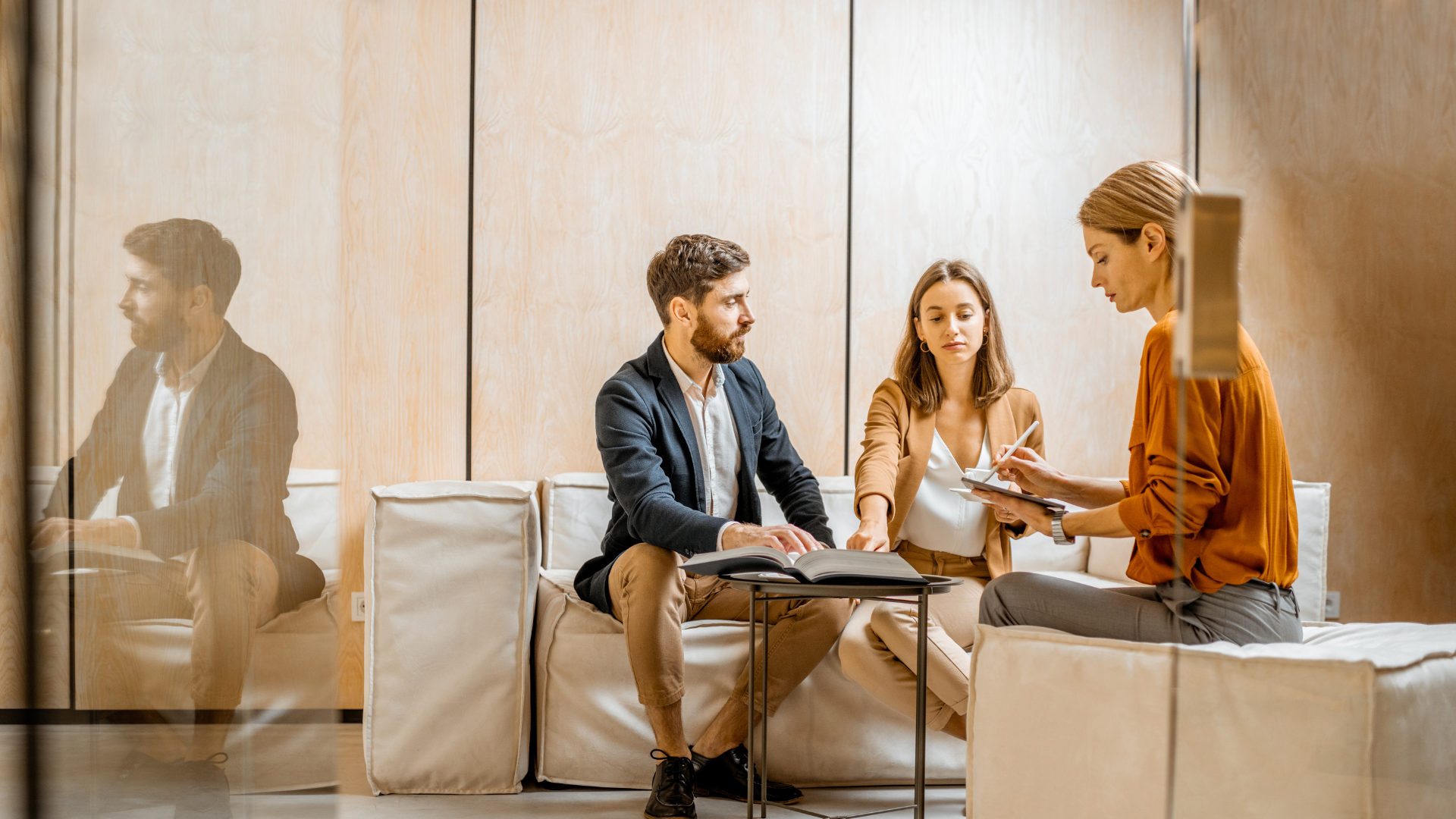 A person reviewing financial statements with a financial advisor.