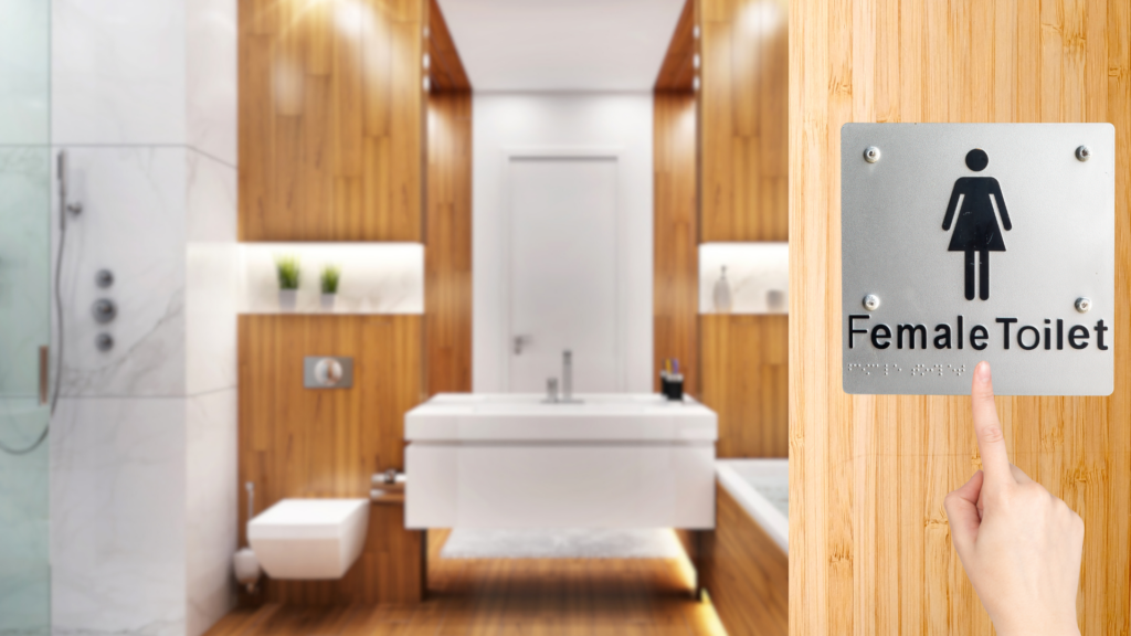 Clear, high-contrast signage with braille for accessibility.