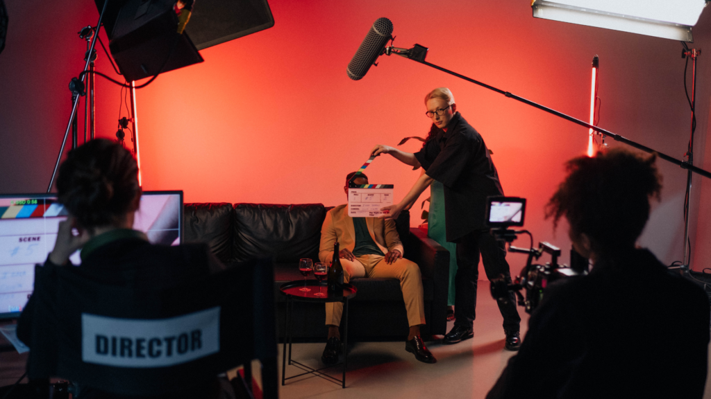 A film crew setting up equipment at a shoot location.