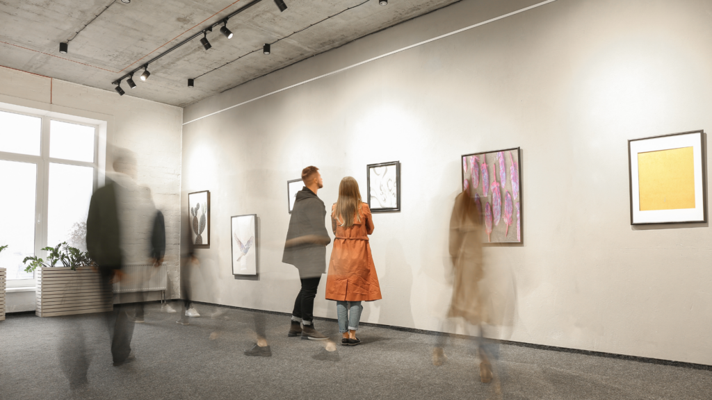 Home exhibit featuring local artwork displayed on walls, creating a creative and inviting atmosphere for visitors.