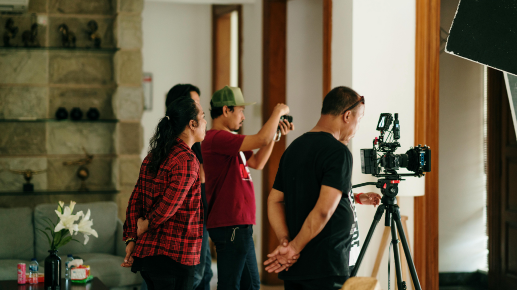 A film crew setting up a shoot at a versatile location for a web series.